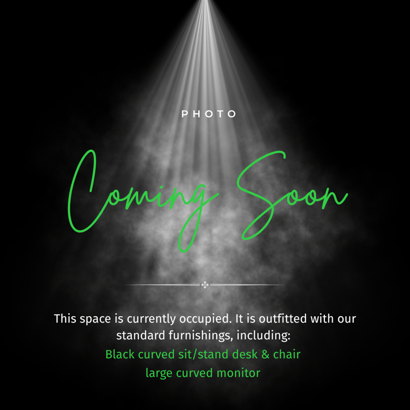 Coming soon placeholder for Suite 124 private executive office, featuring a sit-stand desk and curved monitor.