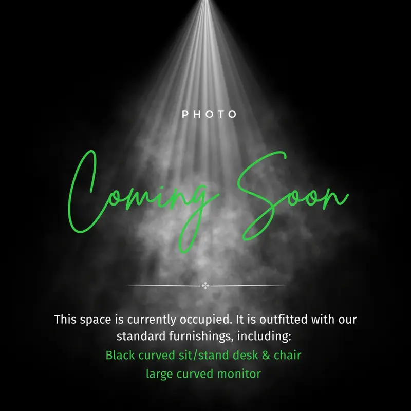 Coming soon placeholder for Suite 124 private executive office, featuring a sit-stand desk and curved monitor.